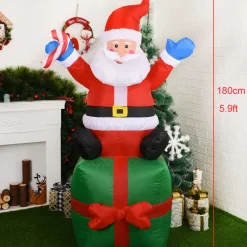 Structure De Noël Gonflable : Père Noël Assis Sur Un Cadeau